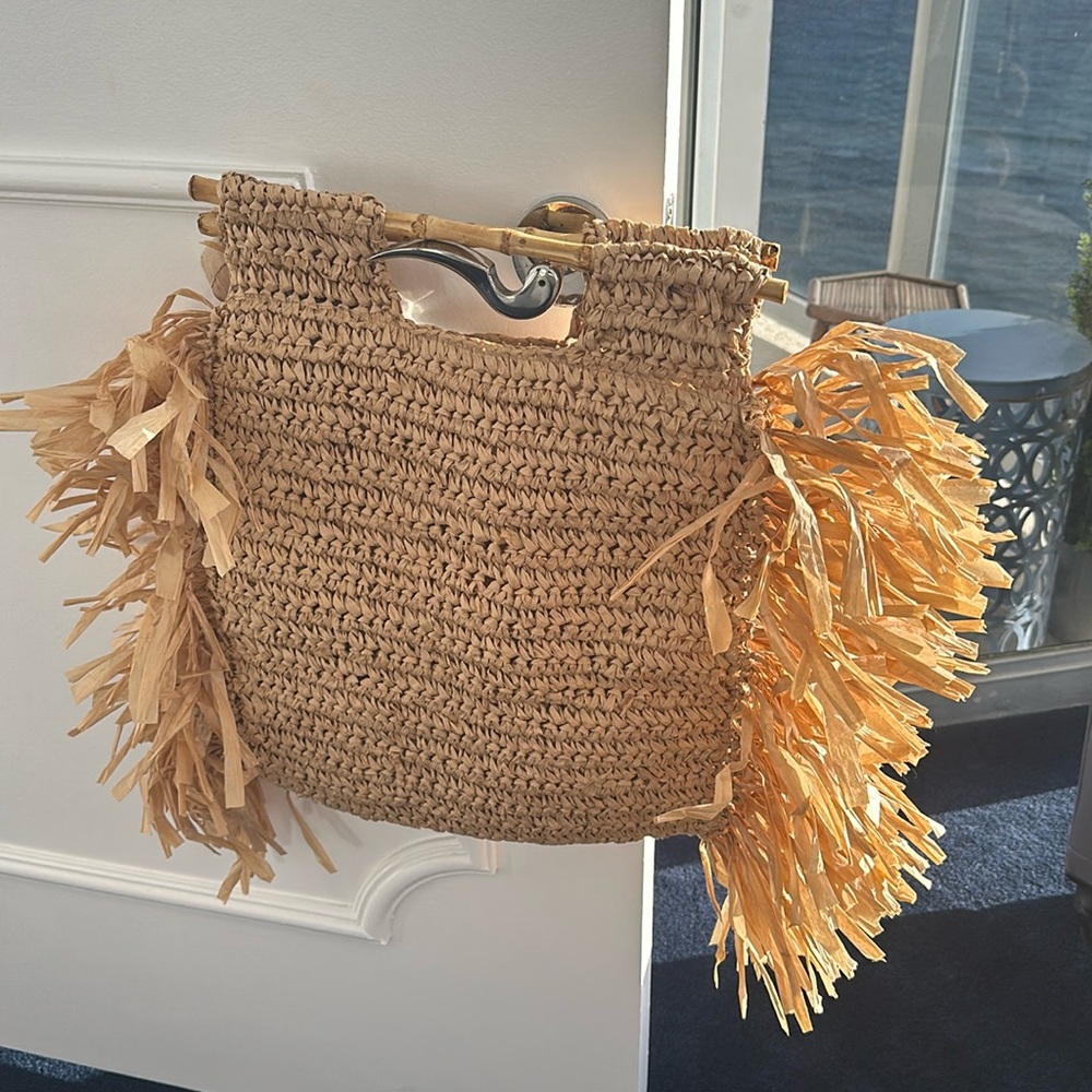 nice roomy stylish beach bag...bamboo handles
